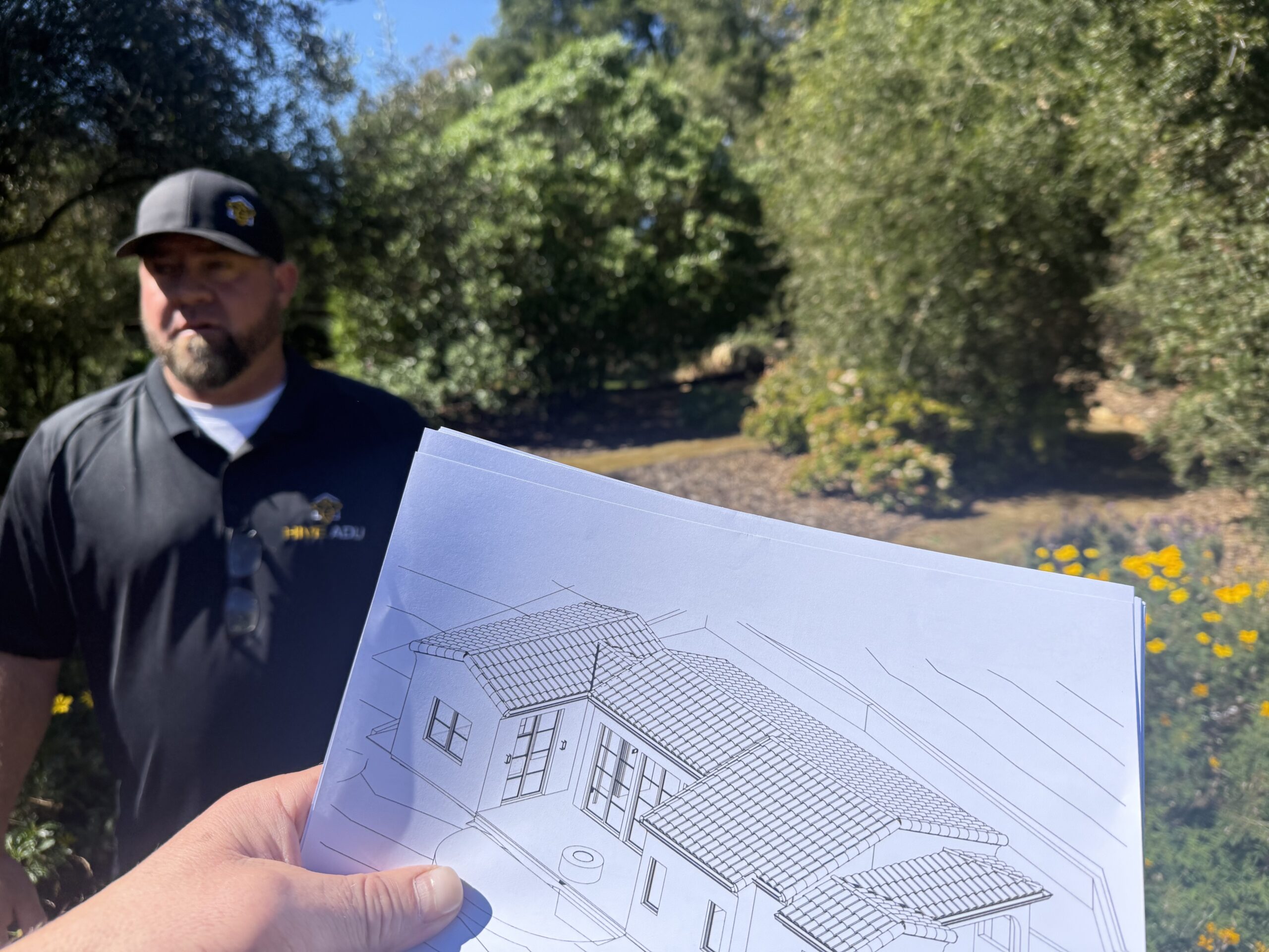 Hive ADU contractor reviewing ADU design plans on a Montecito property.